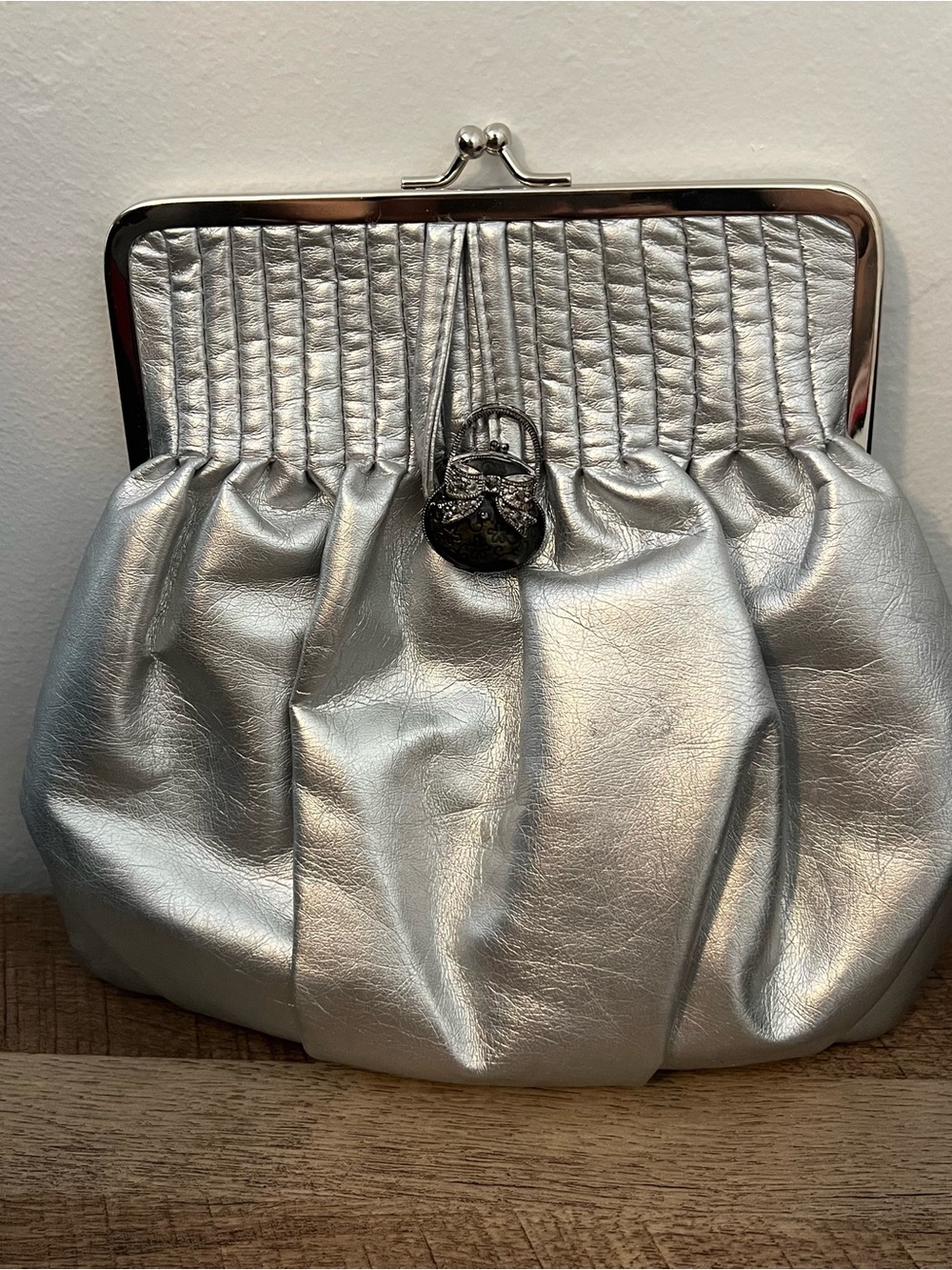 Silver Metallic Evening Pleated Clutch with rhinestone bow accent pin